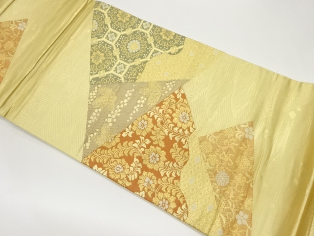 切り嵌め風蜀江華紋に若松・花唐草・笹蔓緞子模様織出し袋帯